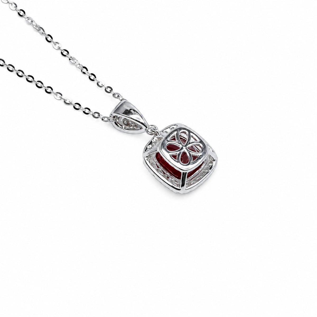 Back of the ruby pendant showing the open white gold setting