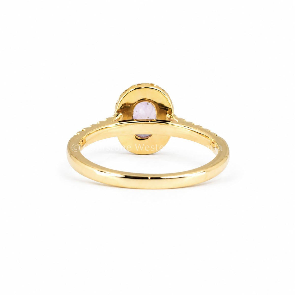 0.77 carat unheated padparadscha sapphire ring in 18K yellow gold