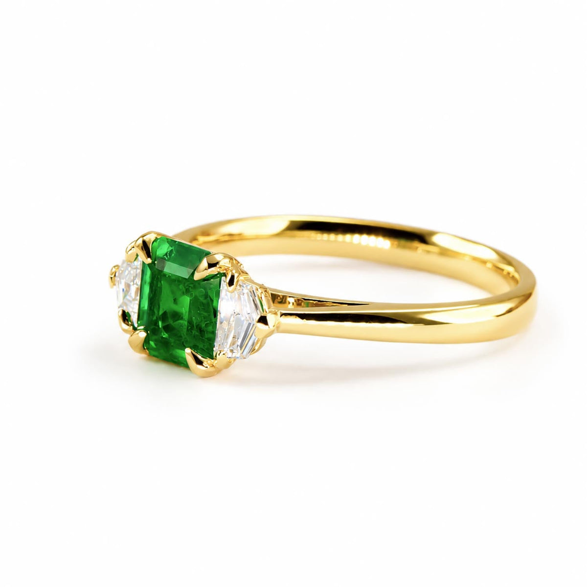 Emerald Cut Colombian Emerald and Cadillac Diamond Three Stone Ring in 18K Yellow Gold – detail view