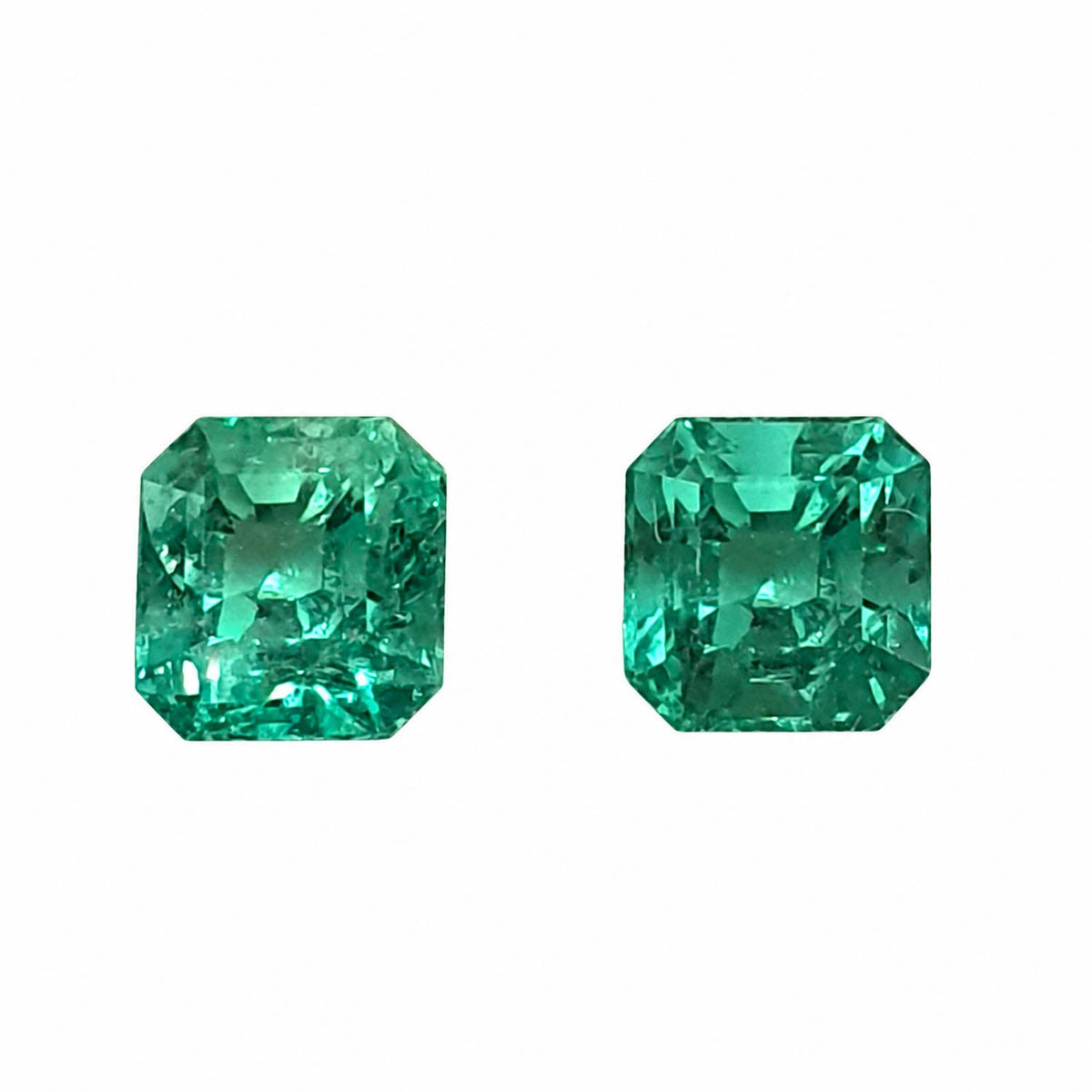 Matched pair of natural Colombian emeralds totalling 1.87 ct, emerald cut