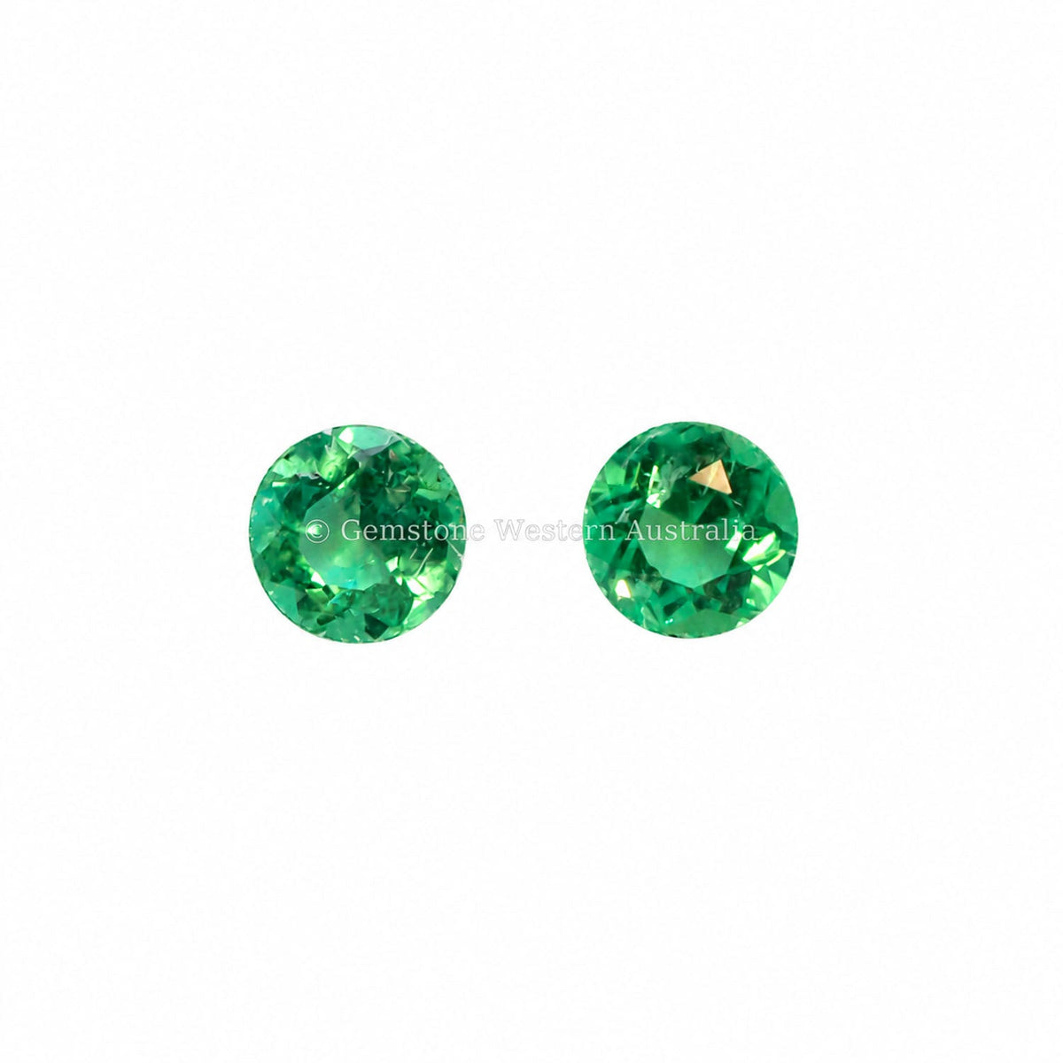 Matched pair of natural Colombian emeralds totalling 0.33 ct, round cut