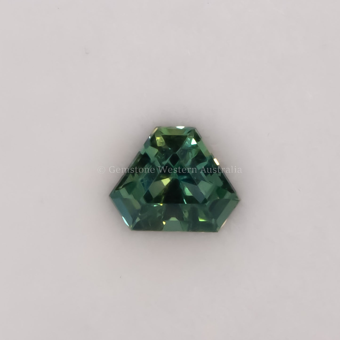 0.59 CT NATURAL UNHEATED TEAL-GREEN SAPPHIRE - SHIELD FANCY CUT
