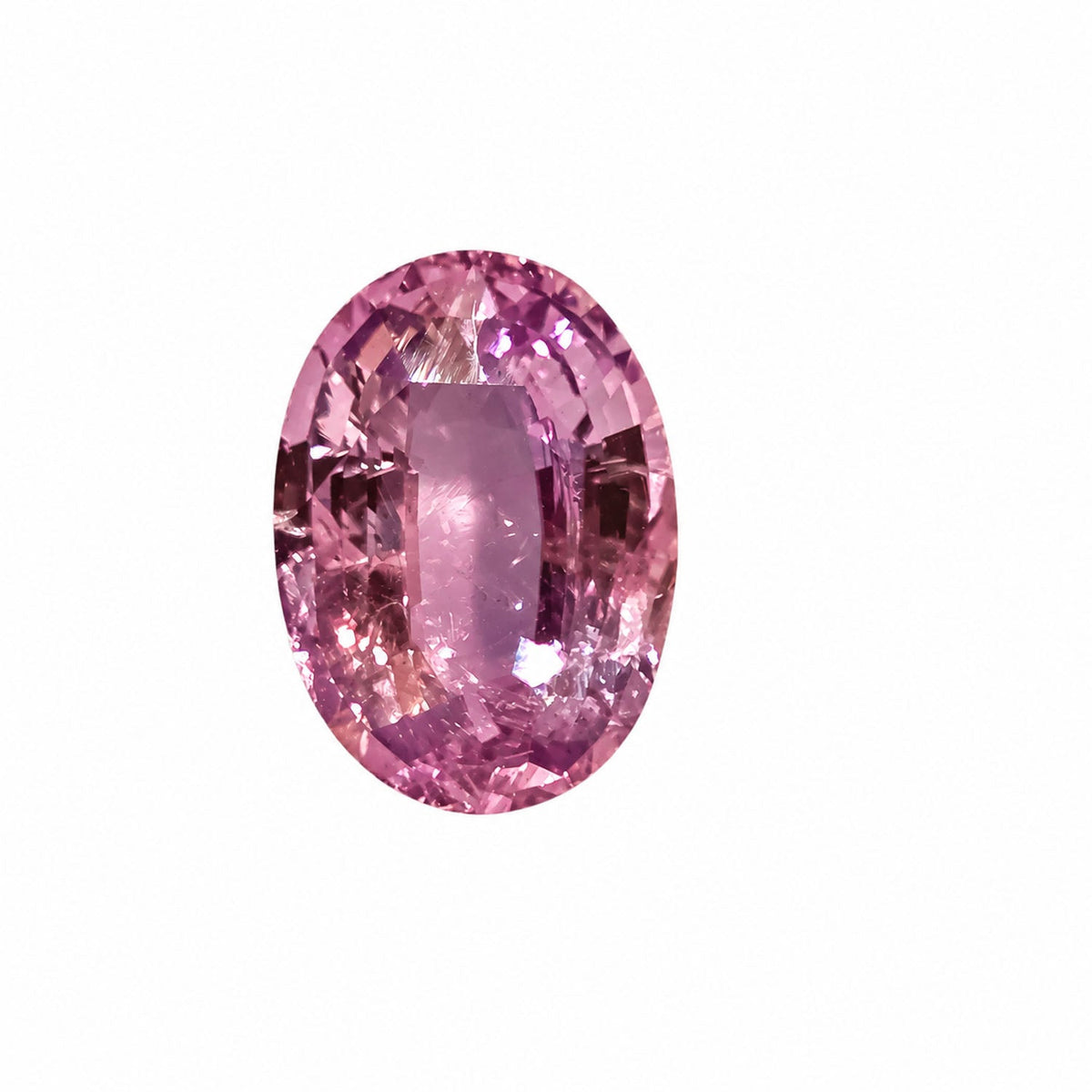 1.65 ct alexandrite under warm light showing its colour change