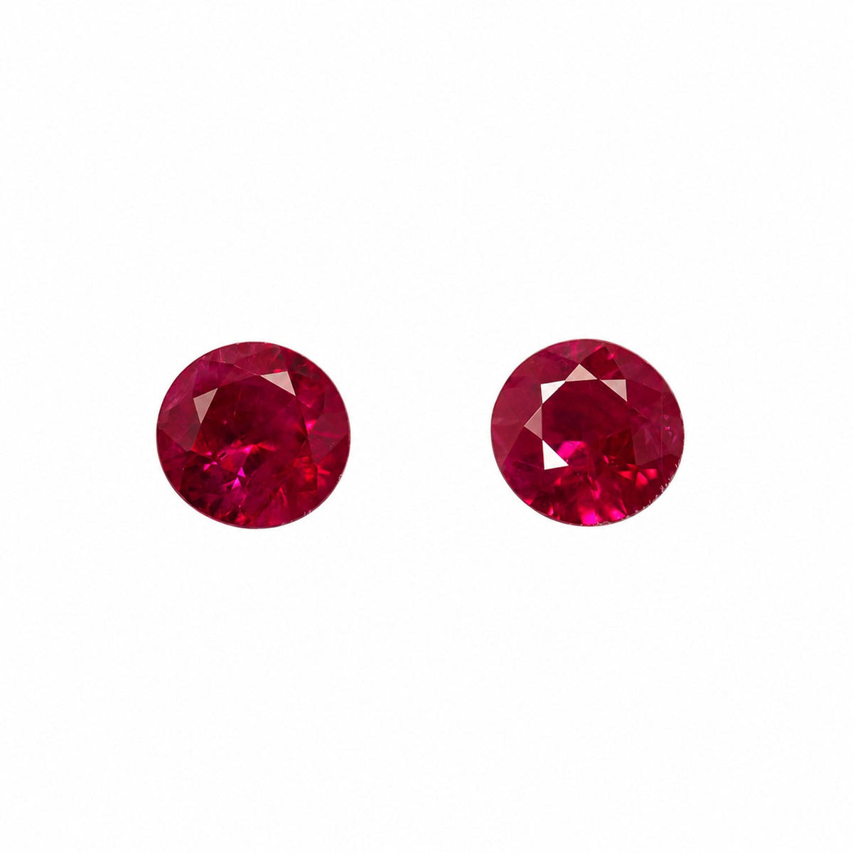 Matched pair of natural rubies totalling 0.61 ct, round cut
