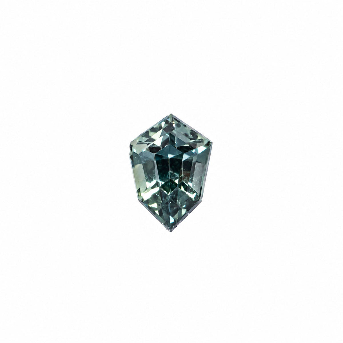 0.65 ct natural unheated teal-green sapphire, shield fancy cut
