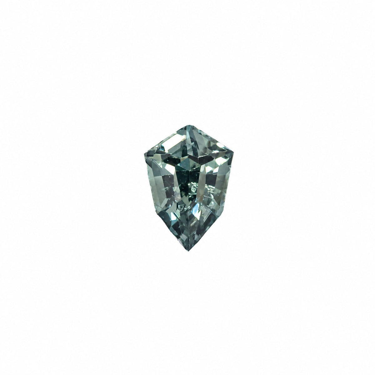 0.51 ct natural unheated teal-green sapphire, shield fancy cut