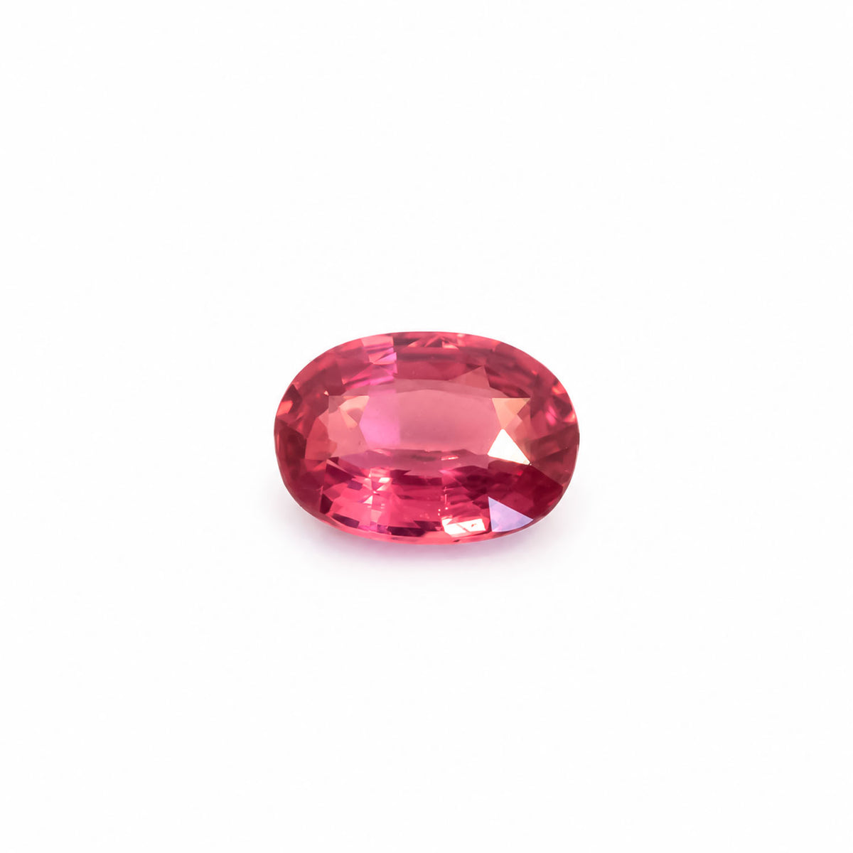 0.75ct natural pinkish orange padparadscha sapphire, oval mixed cut