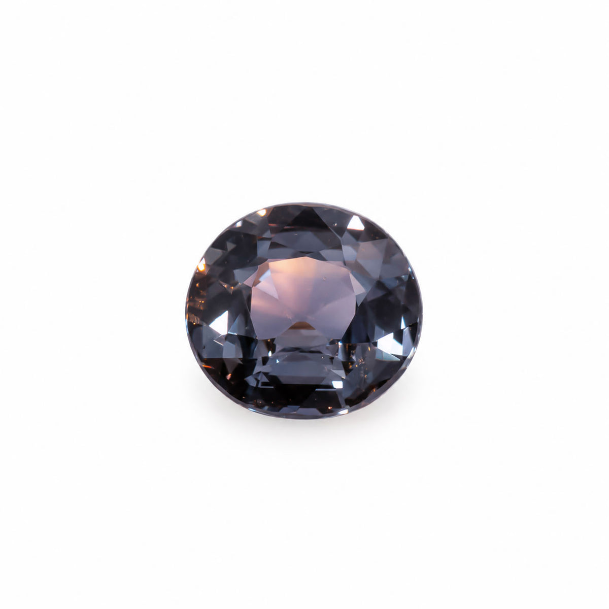 1.55ct natural peacock colour change sapphire, oval cut, showing violet and rose tones