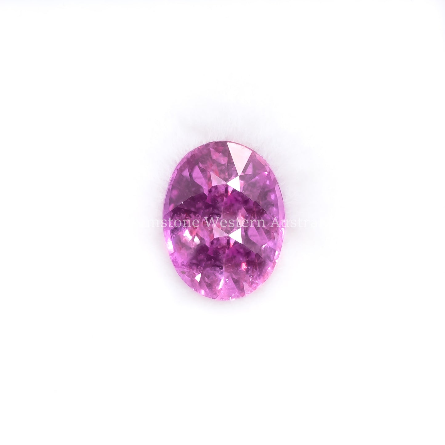 Front view of 1.01 Ct Natural Pink Sapphire Loose Gemstone Oval Cut in white background.