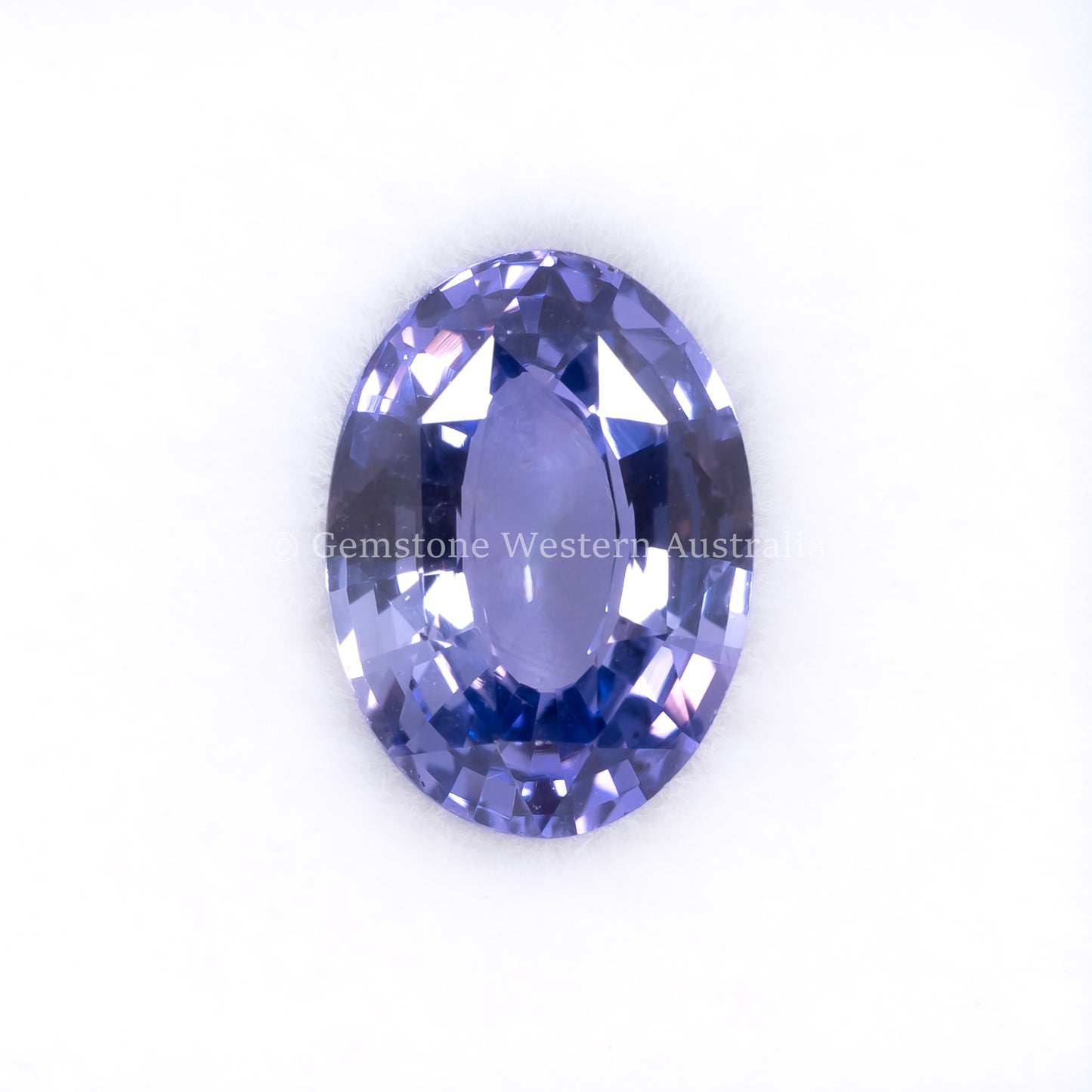 Front view of 2.81CT Natural Unheated Violet Sapphire – Oval Mixed Cut in white background.