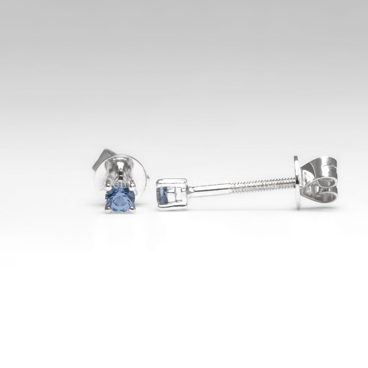 front and side view of Blue Sapphire Stud Earrings in Platinum – 2.5mm Round Cut in neutral background
