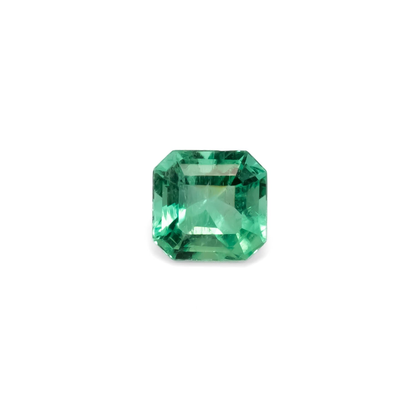 front view of 1.26CT Natural Colombian Emerald – Emerald Cut Vivid Green Gemstone