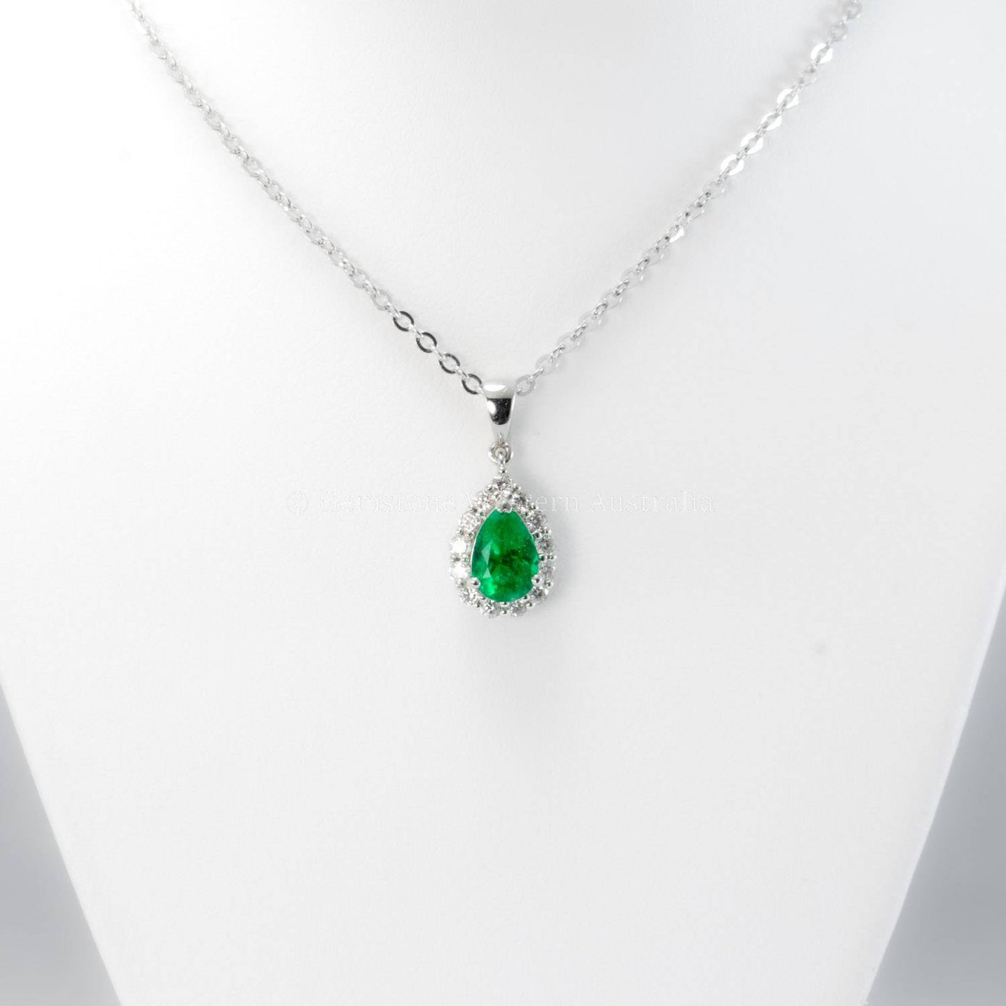 Natural Colombian Emerald and Diamond Halo Pendant in Platinum