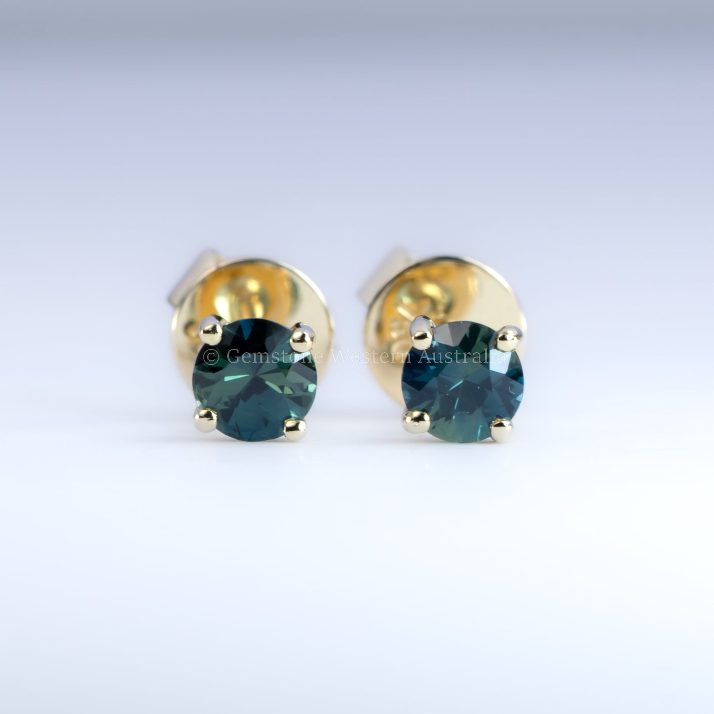 Australian Teal Sapphire Stud Earrings in 18K Yellow Gold – 0.53ct Round Cut