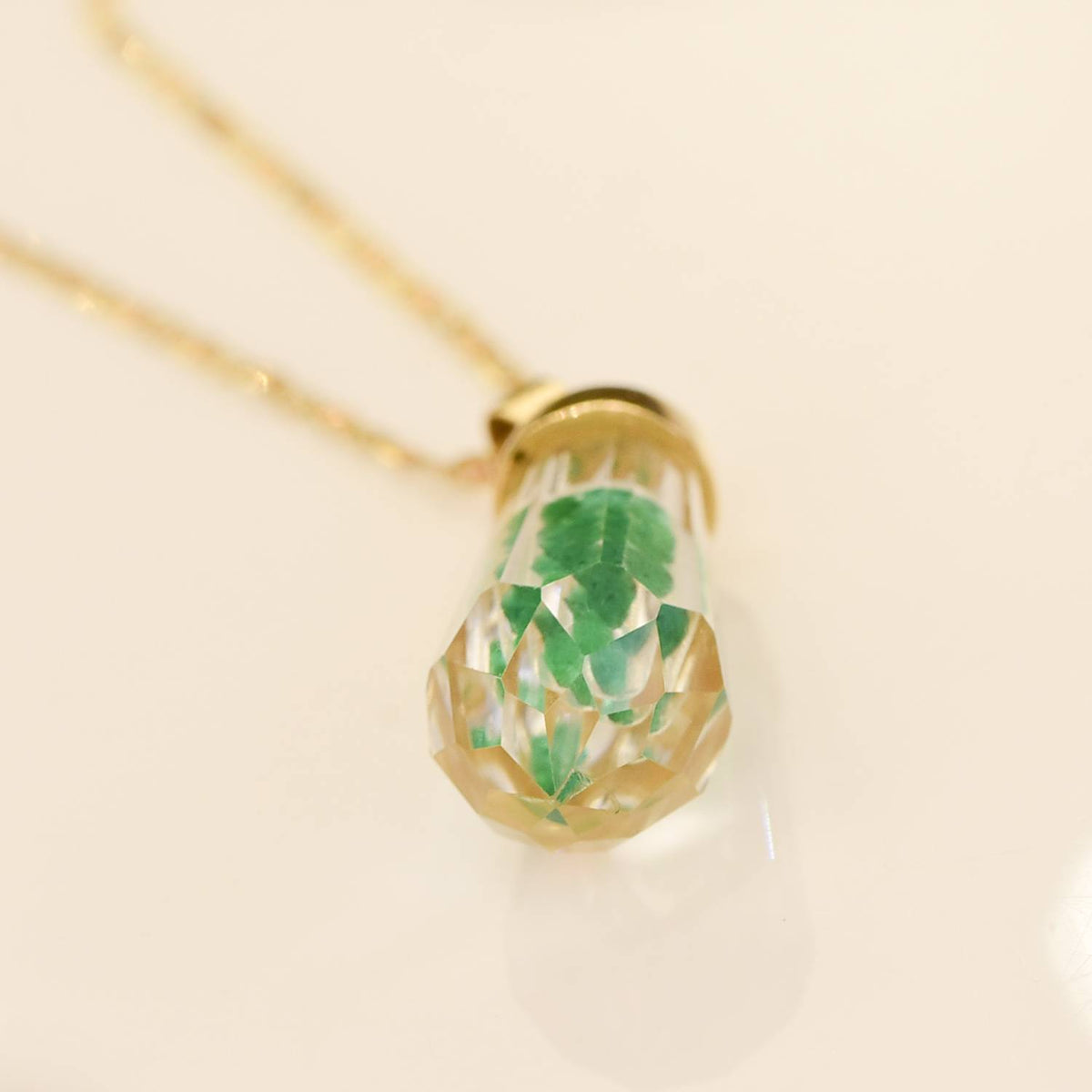 Quartz and Colombian Emerald Pendant and Chain in 18K Gold