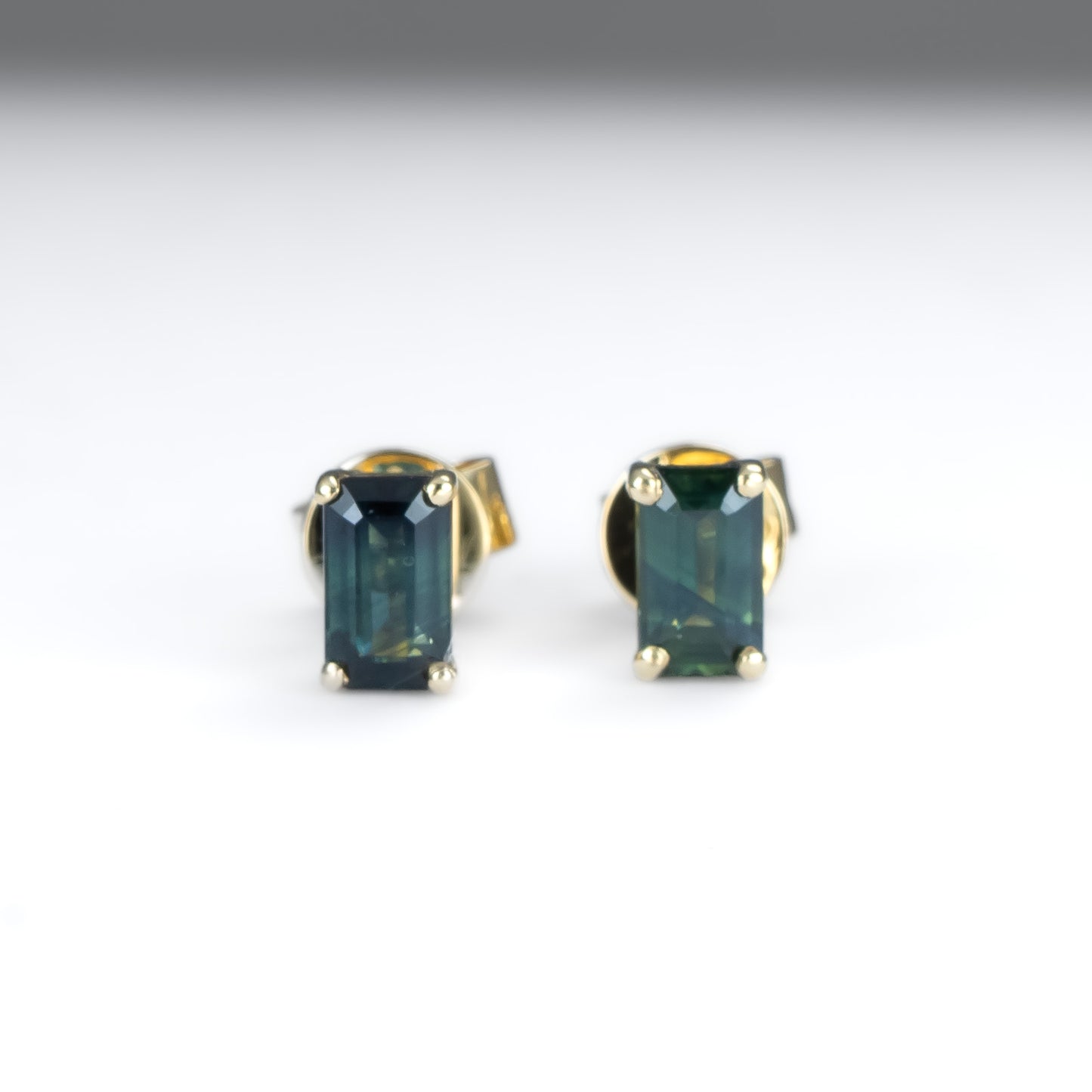 Emerald Cut Sapphire Earrings in 18K Yellow Gold with Australian Teal Sapphires