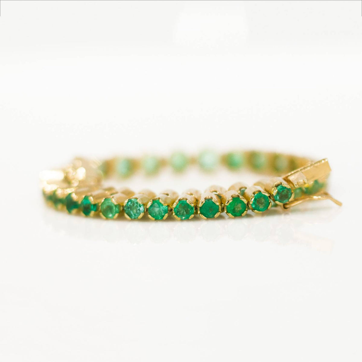 6.82ct Colombian Emerald Tennis Bracelet in 18kt Yellow Gold