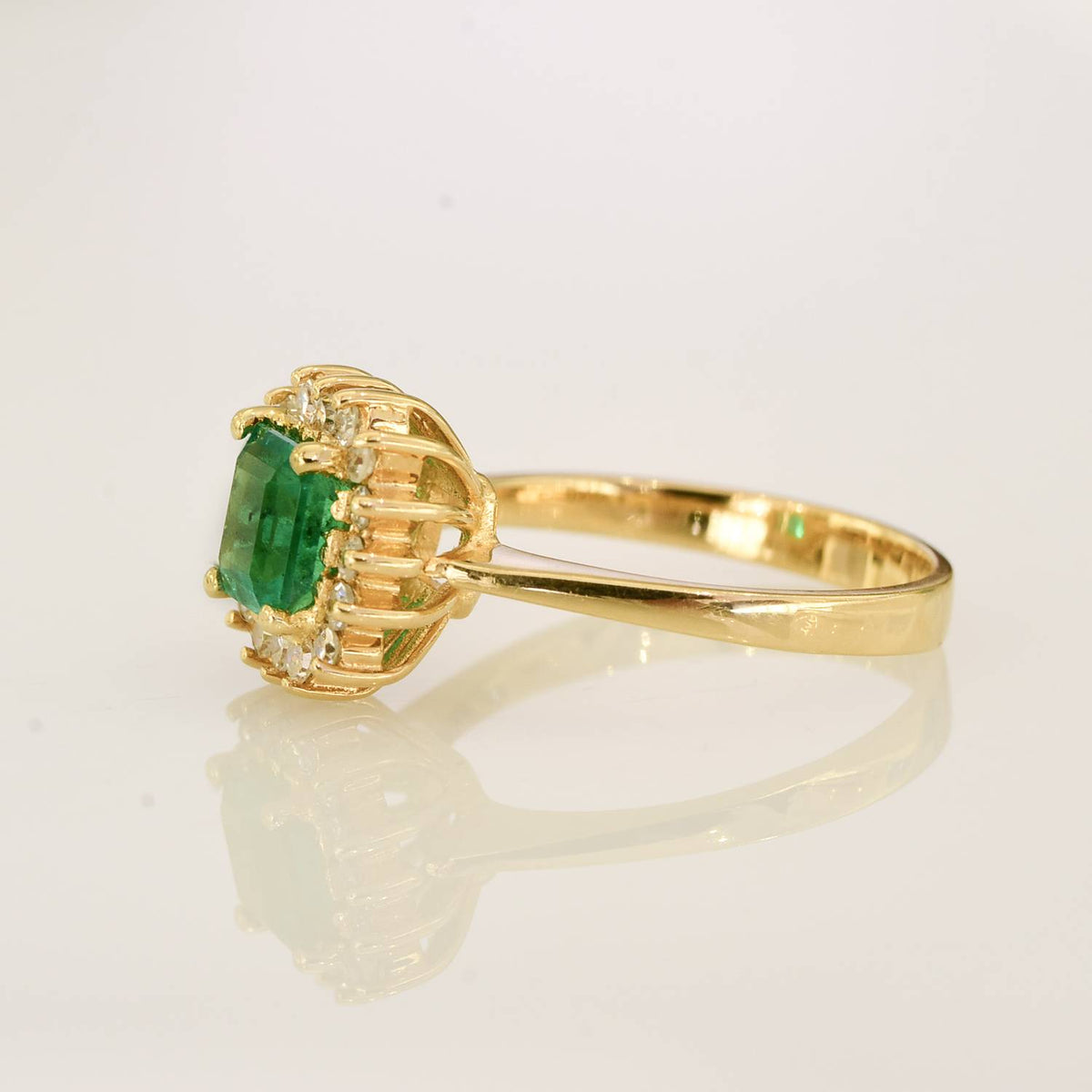 Colombian Emerald and Diamond Halo Ring Emerald Cut 18k Gold