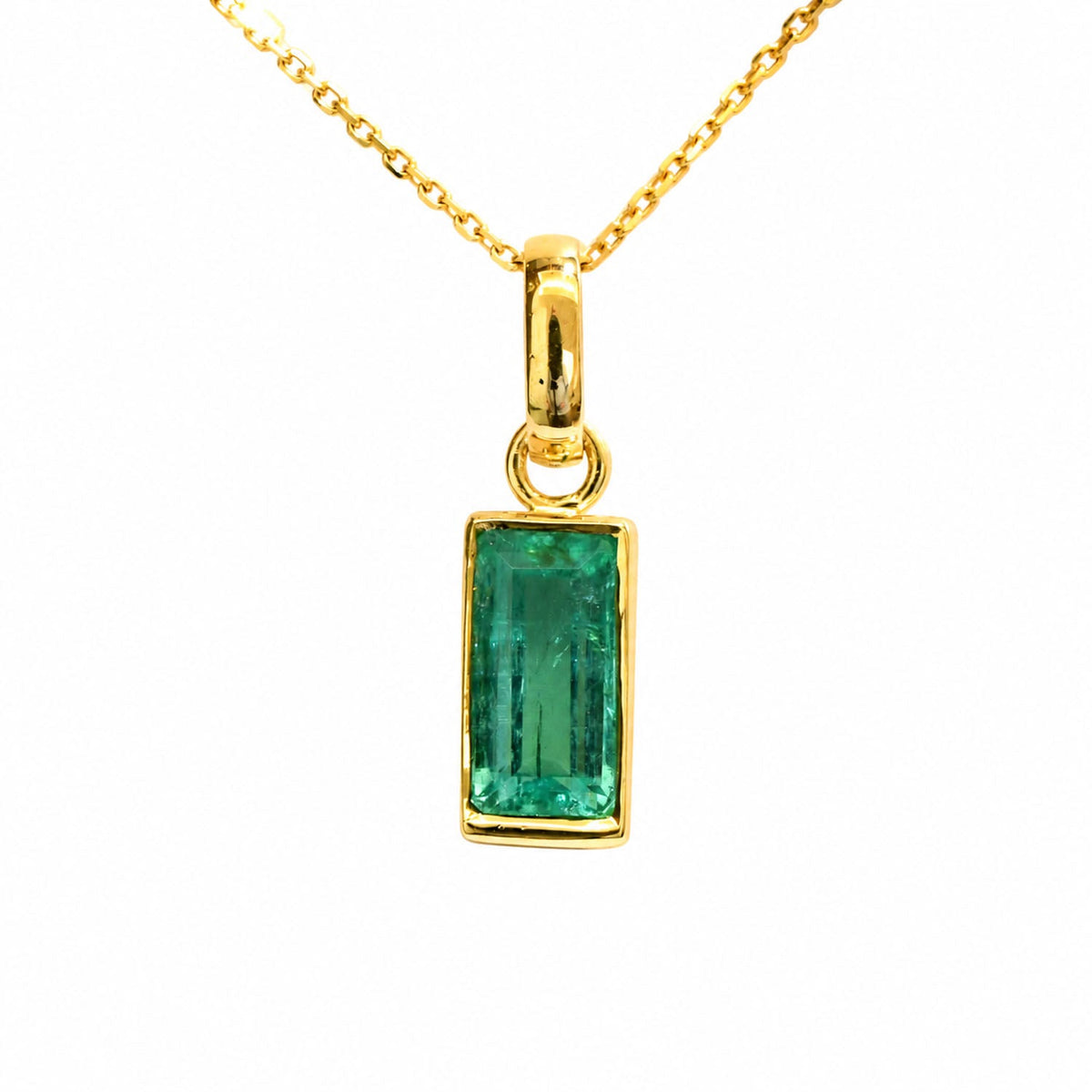2.32 ct Colombian emerald pendant hanging from its 18K gold chain