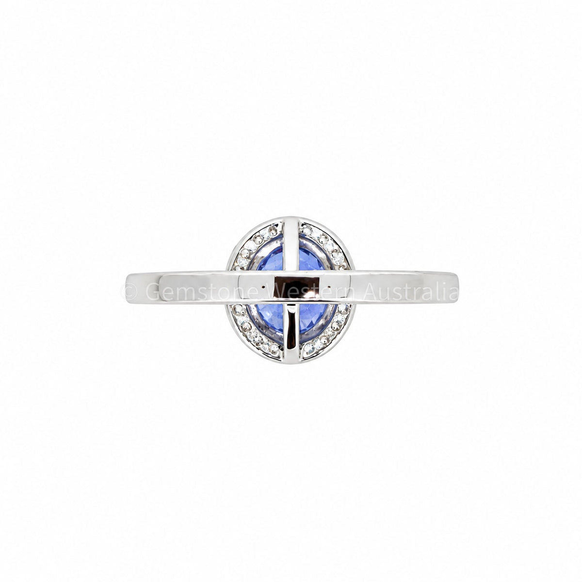 Sapphire halo ring viewed end-on showing the hallmarked white gold band