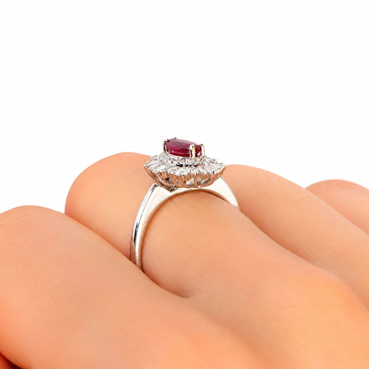 Unheated ruby Art Deco ring worn on the finger, close view