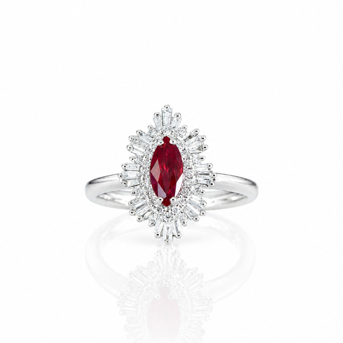 Vivid red marquise ruby framed by baguette and round diamonds