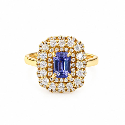 Ceylon sapphire ring with a double diamond halo in 18K yellow gold