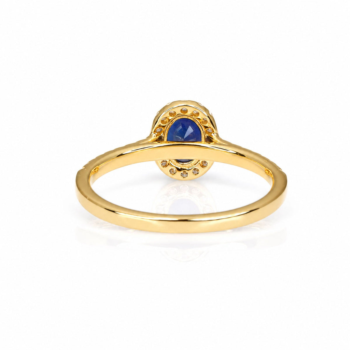 Back of the sapphire ring showing the open yellow gold gallery