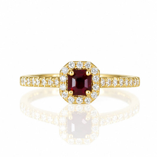 Natural ruby and diamond halo ring in 18K yellow gold