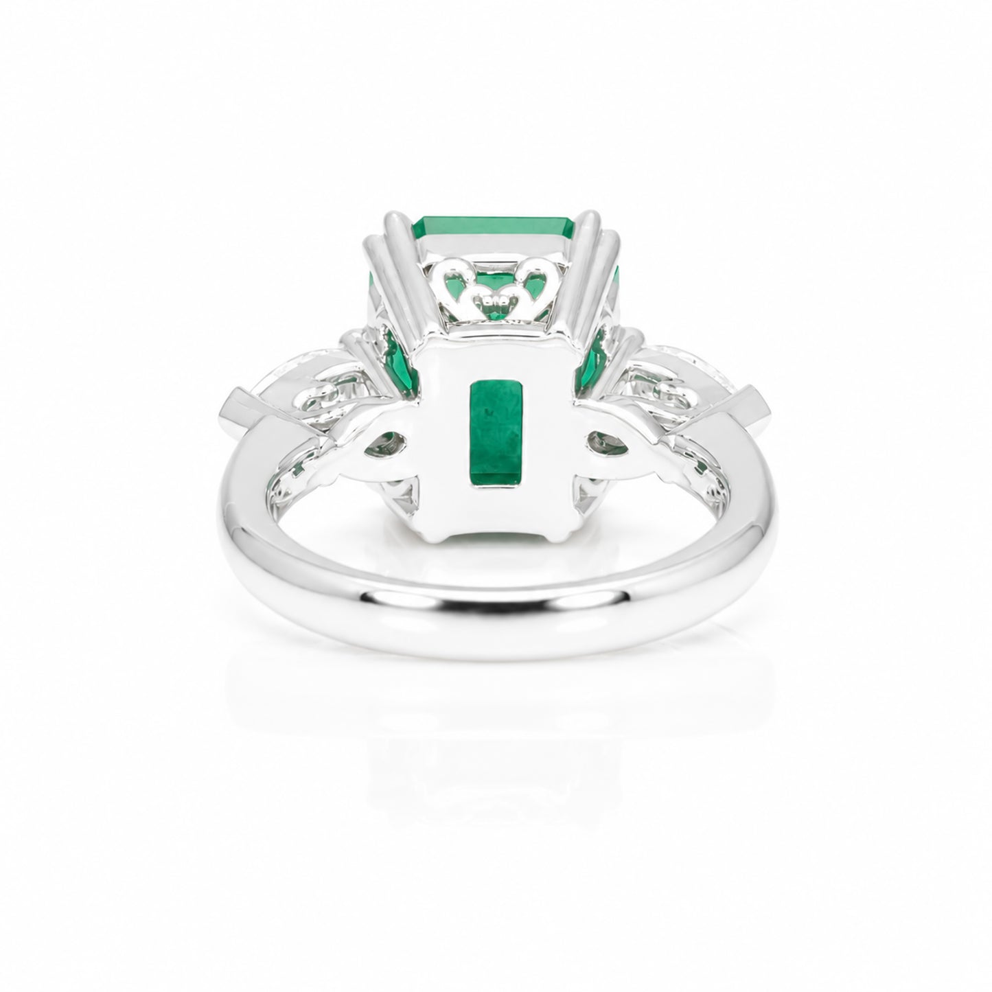 back view of a 6.46 Carats Colombian Emerald and Diamond Statement Ring with GIA Certified diamonds in a white background