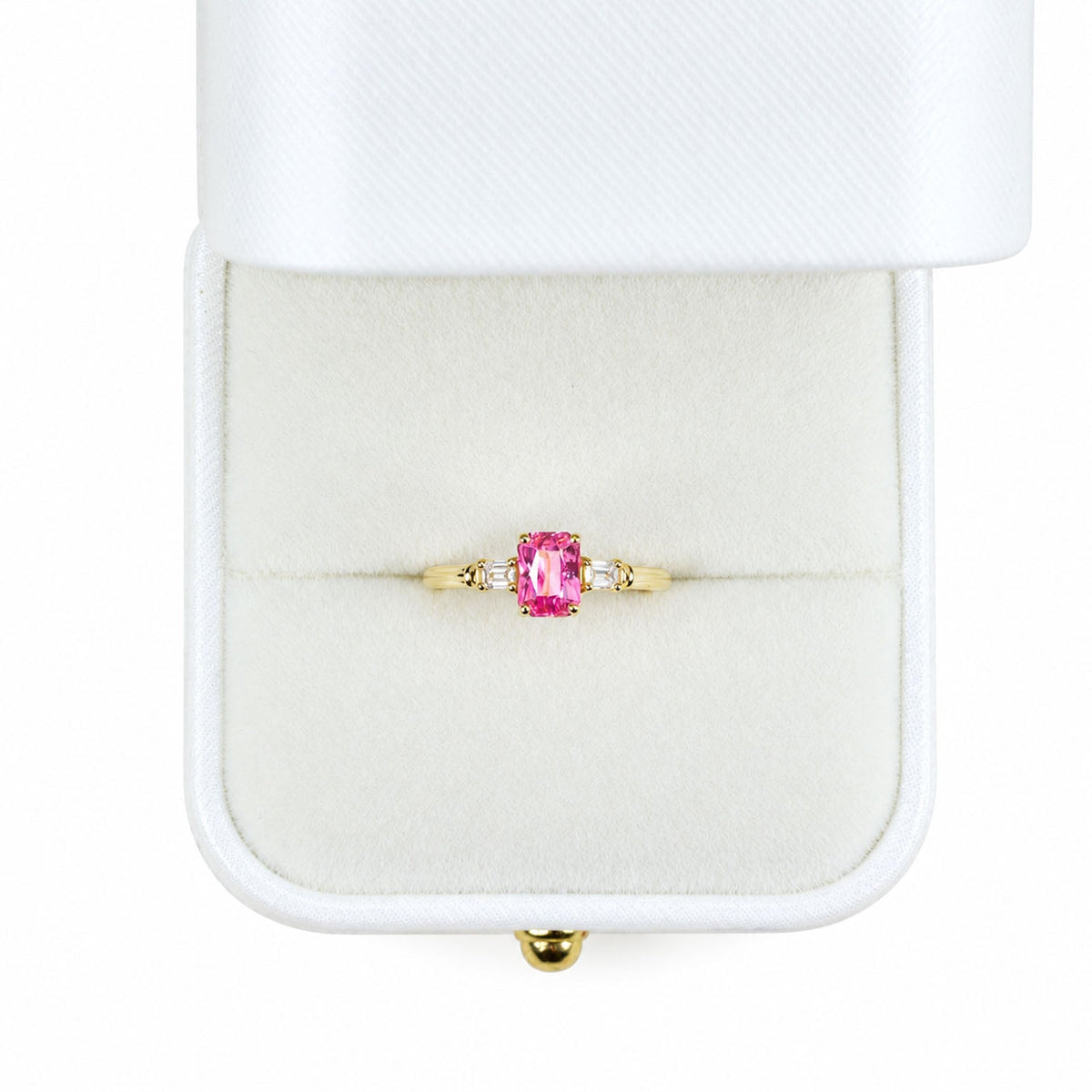 Padparadscha sapphire ring presented in its Gems and Gold box