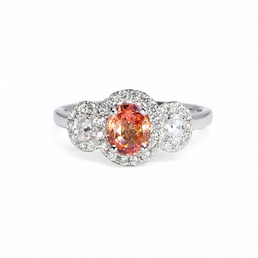 Padparadscha sapphire three stone halo ring in white gold