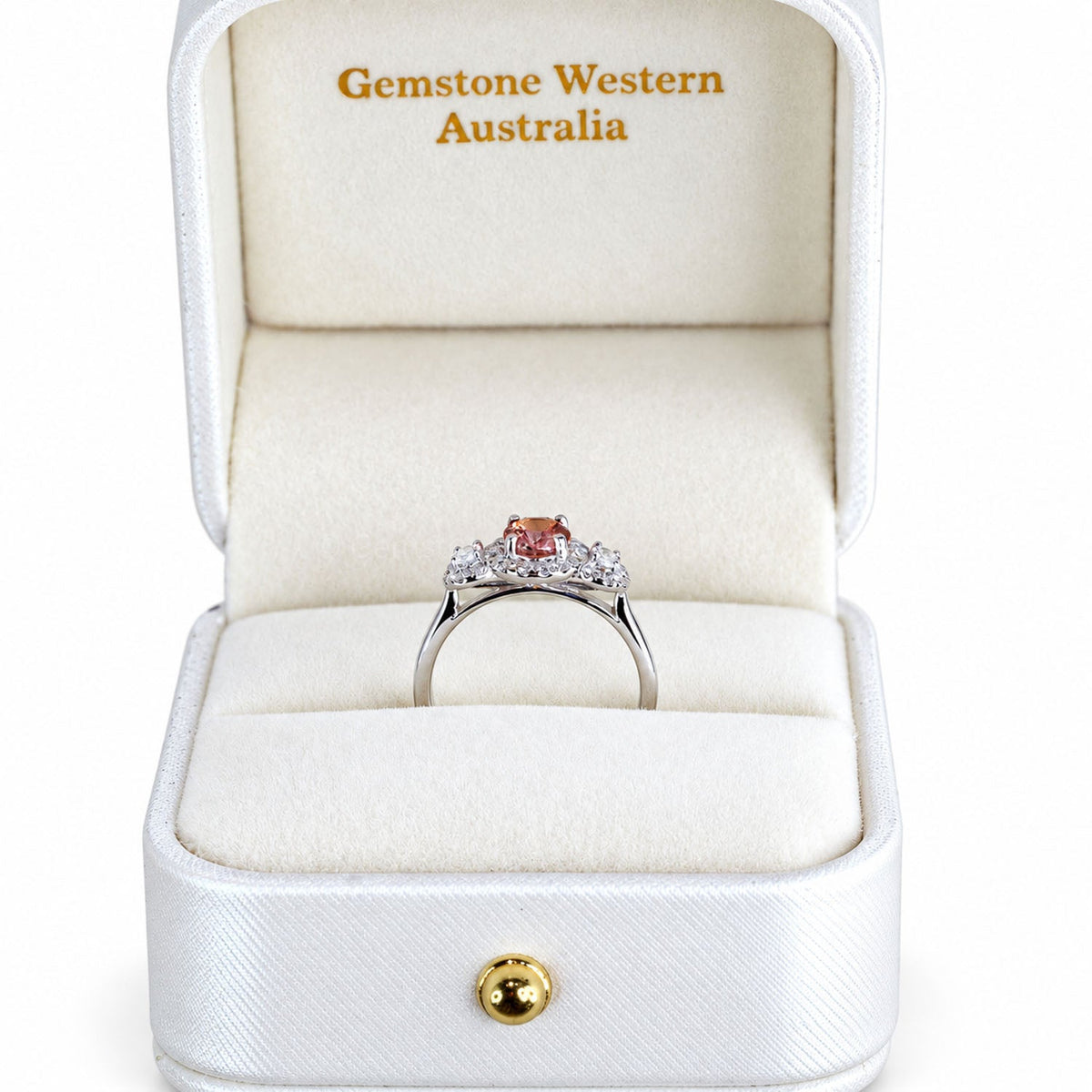 Padparadscha sapphire ring in its Gems and Gold presentation box