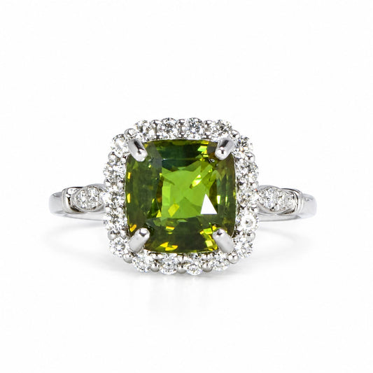 3.60 ct alexandrite with a diamond halo in platinum, green in daylight