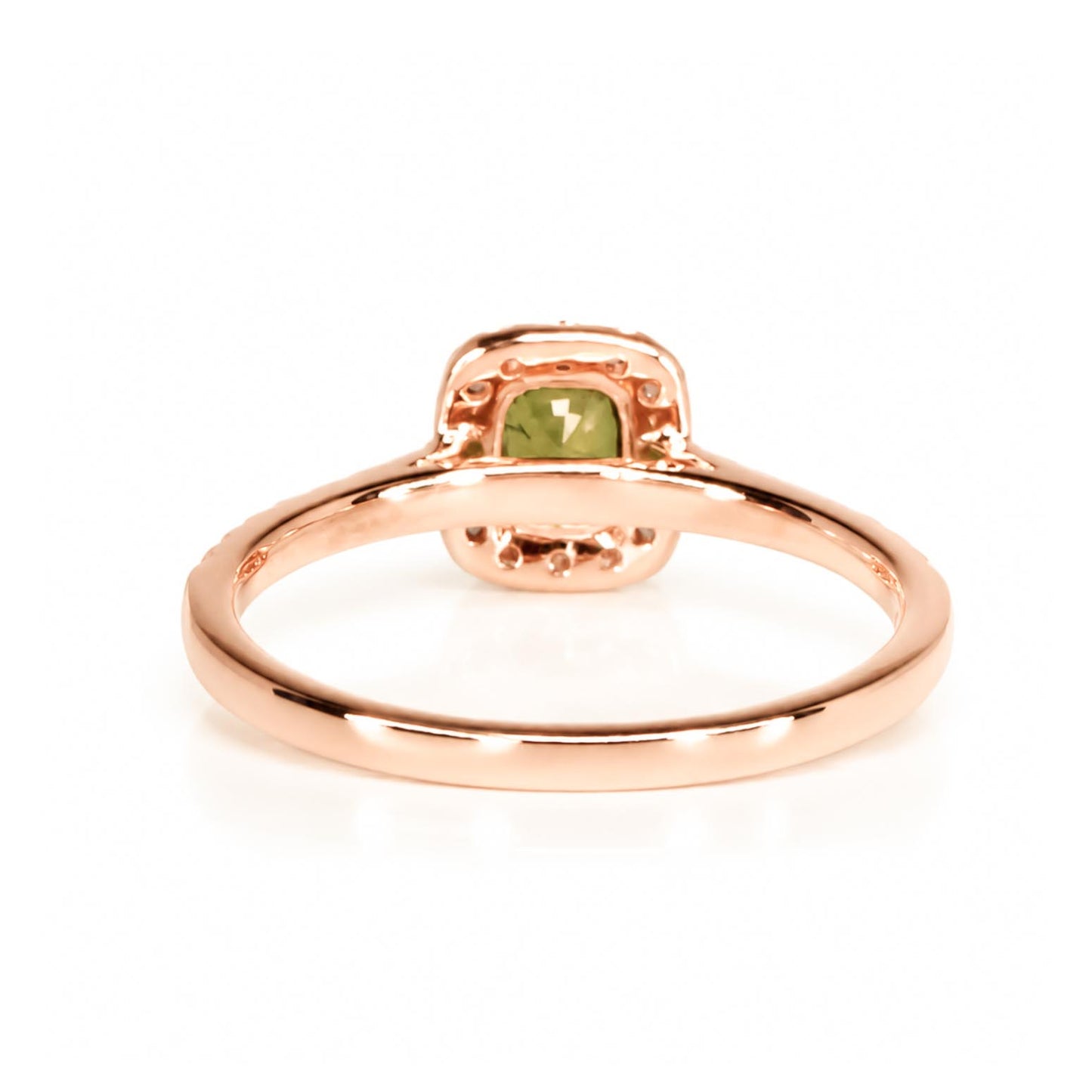 Back view of a rose gold ring featuring a cushion-cut alexandrite gemstone on a clean white background.