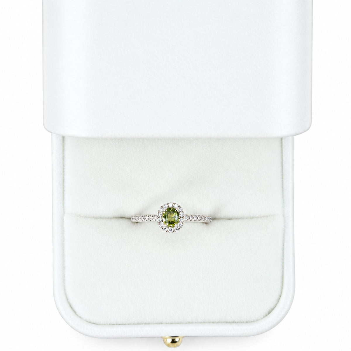 Alexandrite halo ring presented in its white gift box