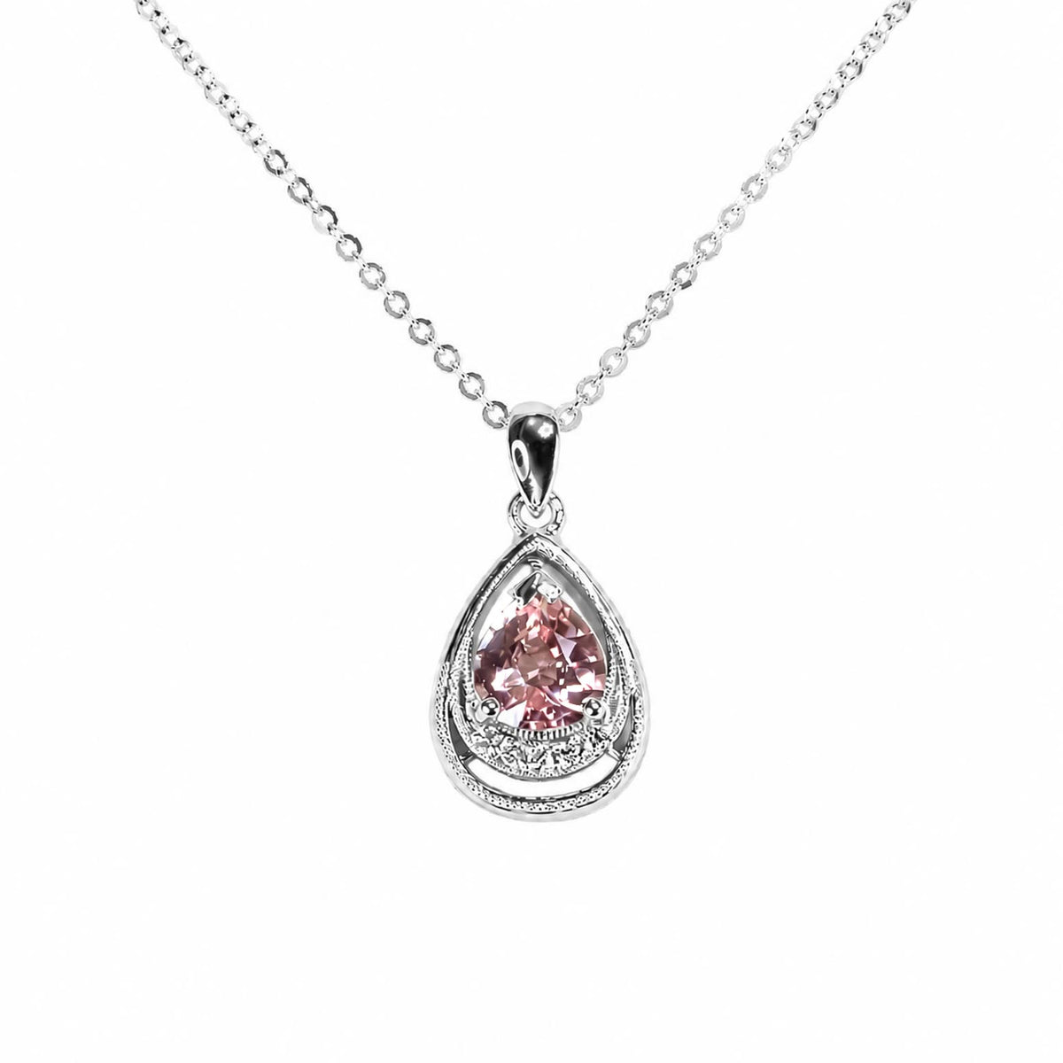 A platinum teardrop pendant necklace featuring a central padparadscha sapphire gemstone accented by a row of diamonds at the bottom of the pendant, suspended from a delicate silver chain on a white background.