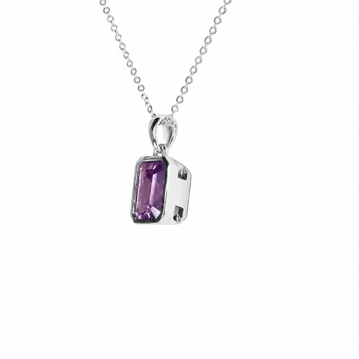 A platinum pendant necklace featuring a rectangular purple sapphire gemstone in a polished platinum bezel setting, suspended from a delicate silver chain against a plain white background.
