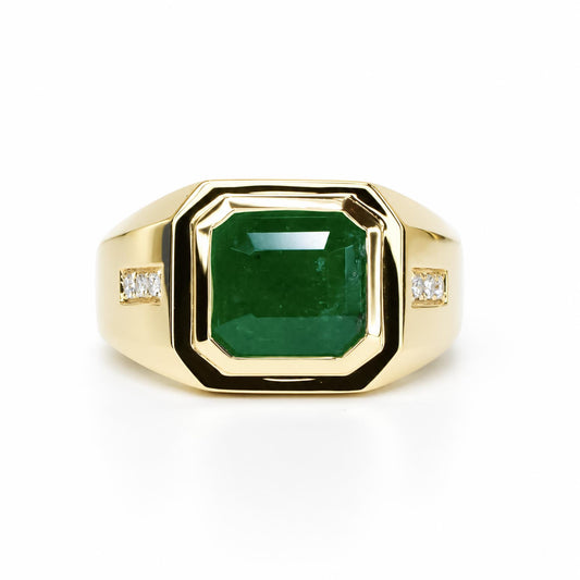 A men's ring in yellow gold with an emerald cut Colombian emerald and a row of side accent diamonds 