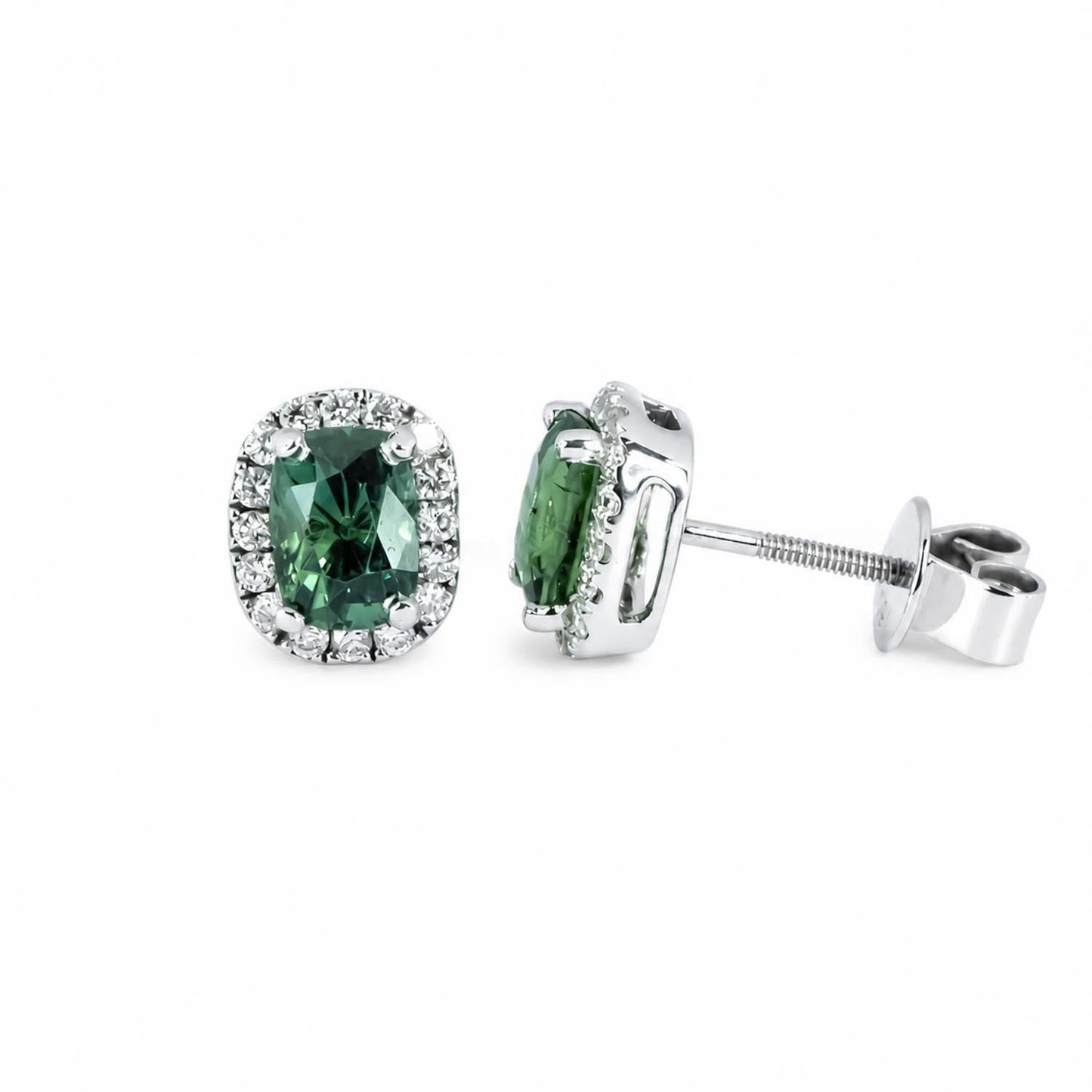 Teal sapphire diamond studs showing screw-back fastening in 18K white gold