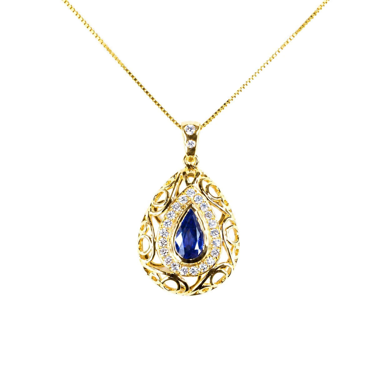 Natural blue sapphire pendant with diamond halo in 18K yellow gold