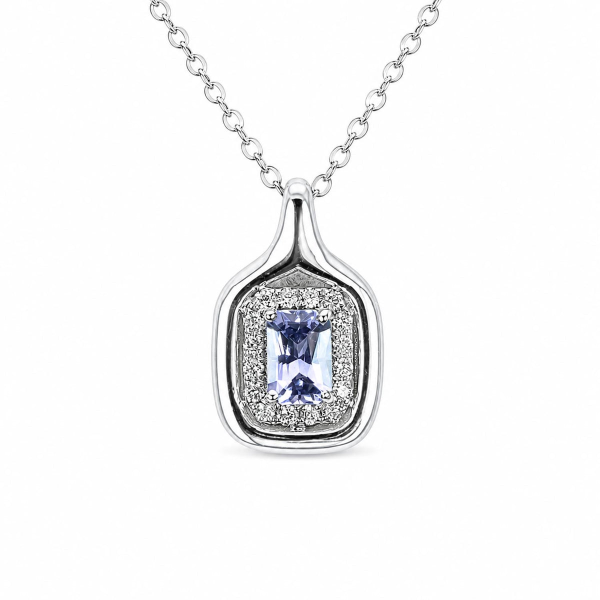 white gold pendant necklace holding a centre violet sapphire surrounded by a halo of diamonds and suspended from a silver chain