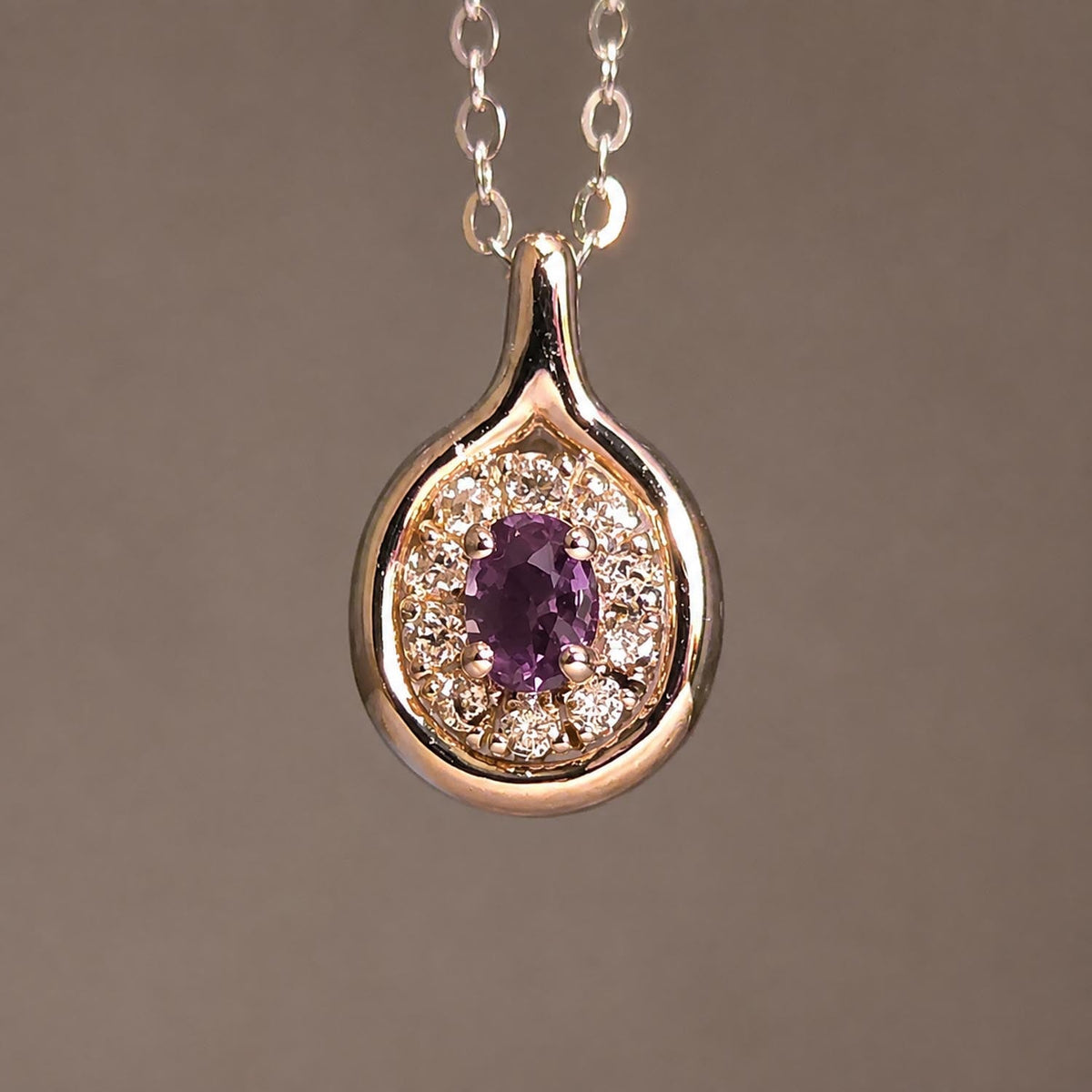 Platinum Alexandrite and Diamond Pendant with Oval Cut Centre