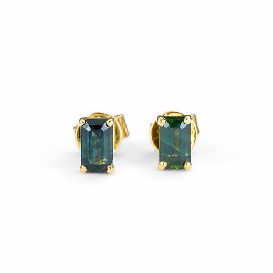 Emerald cut Australian teal sapphire earrings in 18K yellow gold with four prong settings