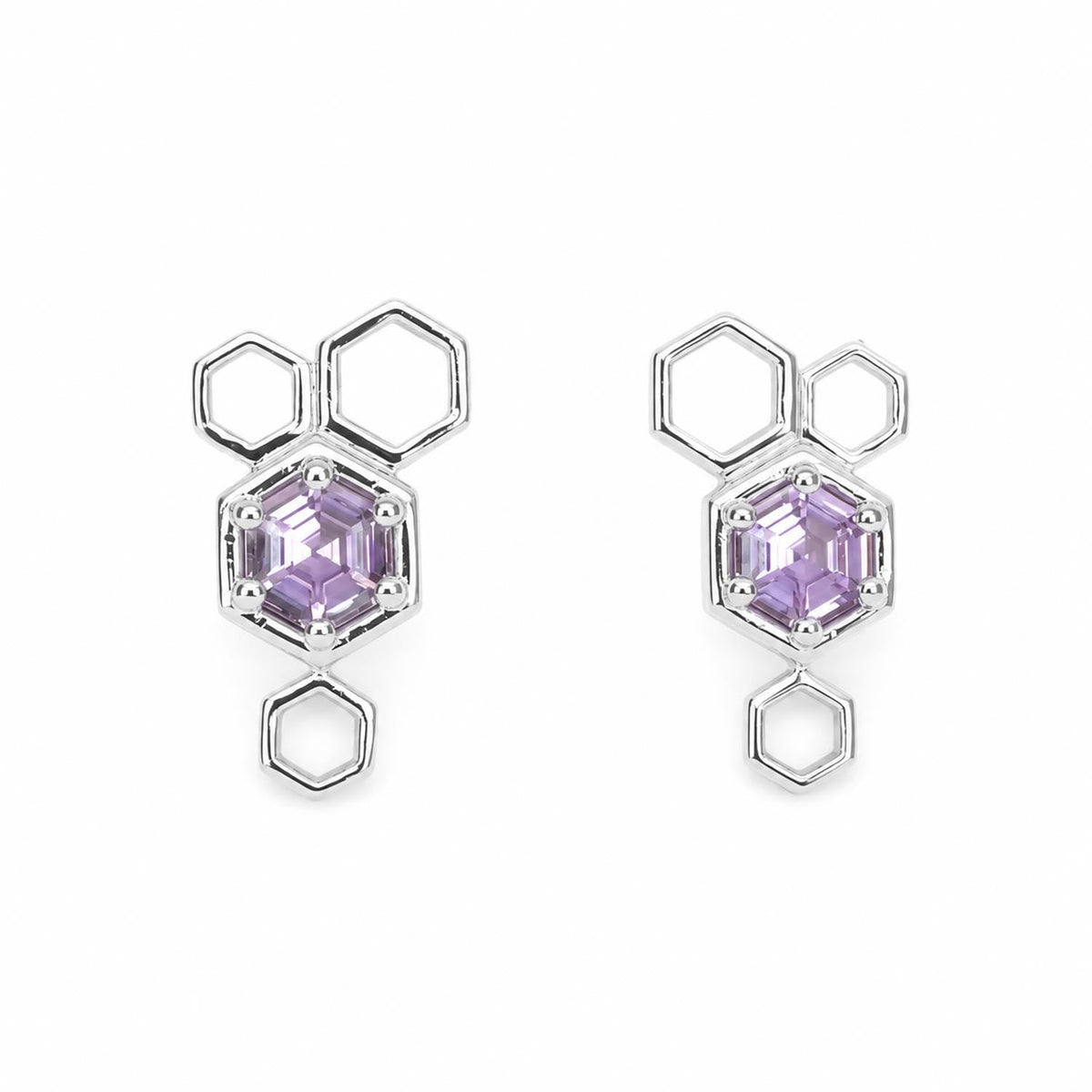 Hexagon pink sapphire earrings in platinum with an open honeycomb design