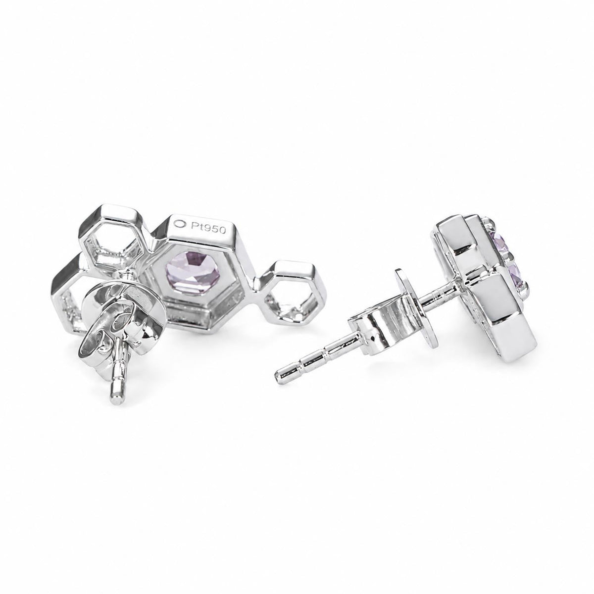 Close detail of the hexagonal pink sapphires set in platinum honeycomb earrings