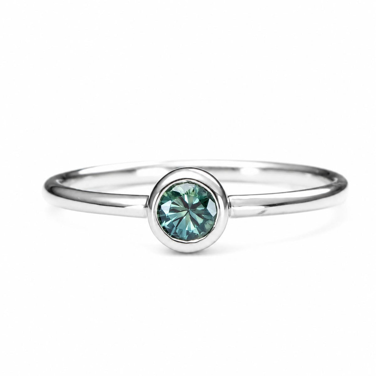 Australian sapphire white gold ring shown on a white background