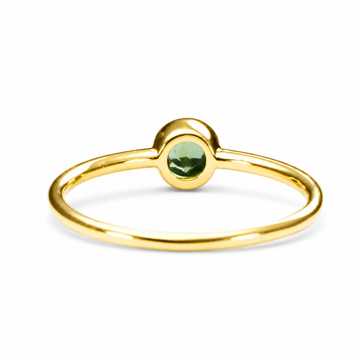 back view of an Australian sapphire yellow gold ring shown on a white background