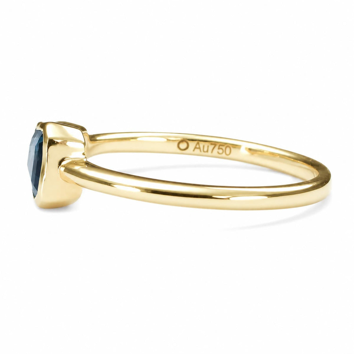Teal blue sapphire ring in 18K yellow gold with diamond accents, top view