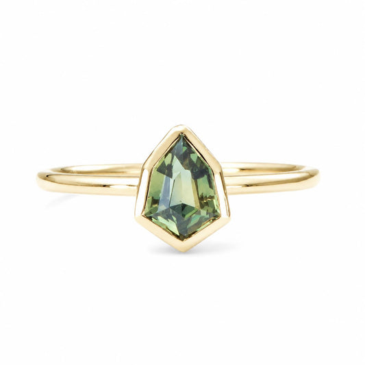 Shield cut teal sapphire ring in 18K yellow gold with a 0.71ct natural sapphire